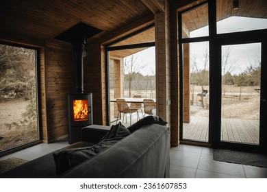 Cozy interior with firestove in the wooden cabin - Powered by Shutterstock