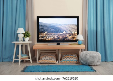 Cozy Interior Of Living Room With TV On Stand