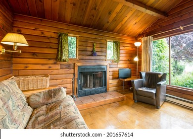 Cozy Interior Of A Rustic Log Cabin.