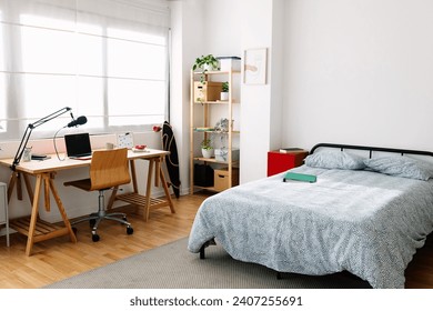 Cozy interior teenager room with bed and desk workplace. Young content creator teenager bedchamber. - Powered by Shutterstock