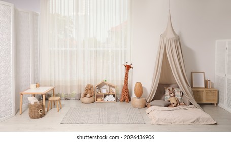 Cozy Kids Room With Play Tent, Toys And Comfortable Floor Bed. Montessori Interior