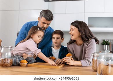 In the cozy kitchen, a family gathers around the table. With smiles on their faces enjoying the simple pleasures of togetherness and sweetness in every bite. - Powered by Shutterstock