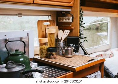 Cozy Kitchen Interior In The Trailer Of Mobile Home Or Recreational Vehicle, Concept Of Family Local Travel In Native Country On Caravan Or Camper Van And Camping Life