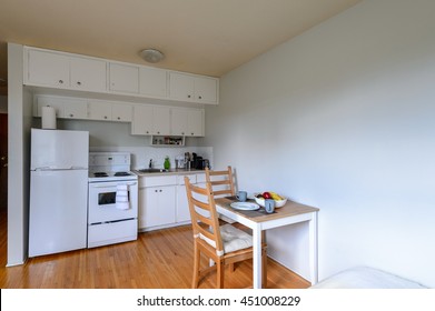 Cozy Kitchen With A Small Dinner Table. Interior Design.