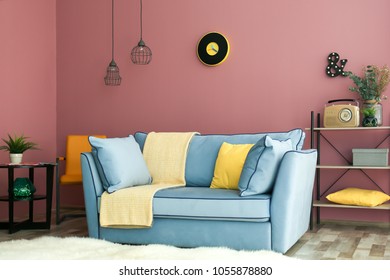 Cozy living room interior with comfortable sofa