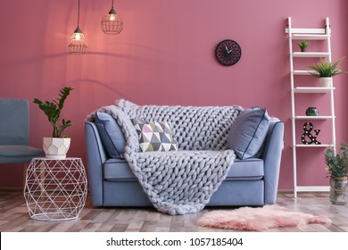 Cozy living room interior with comfortable sofa - Powered by Shutterstock