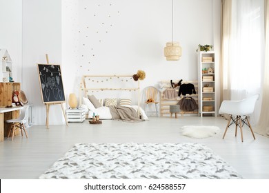 Cozy modern bedroom designed in scandinavian style