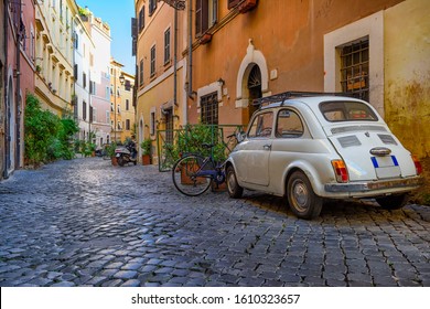 Cozy old street in Trastevere in Rome, Italy. Trastevere is rione of Rome, on the west bank of the Tiber in Rome, Lazio, Italy.  Architecture and landmark of Rome - Shutterstock ID 1610323657