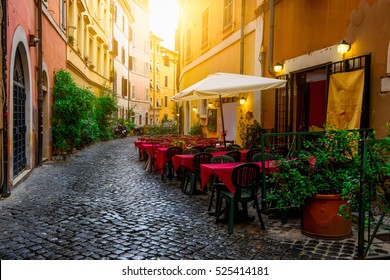 Cozy old street in Trastevere in Rome, Italy.  Trastevere is rione of Rome, on the west bank of the Tiber in Rome, Lazio, Italy.  Architecture and landmark of Rome