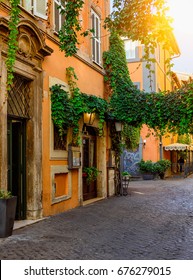 Cozy old street in Trastevere in Rome, Italy. Trastevere is rione of Rome, on the west bank of the Tiber in Rome, Lazio, Italy.  Architecture and landmark of Rome.