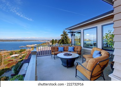 Cozy Patio Area With Comfort Settees And Fire Pit. Deck With Puget Sound View. Tacoma, WA