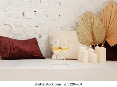 Cozy Place With Burning Candles And White Wine In Boho Home Studio. Relax And Rest Concept