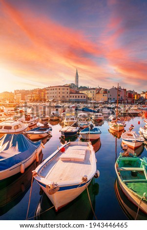 Cozy and quiet town of Rovinj with beautiful colorful houses on the Istrian peninsula, Adriatic sea at sunset  in Croatia