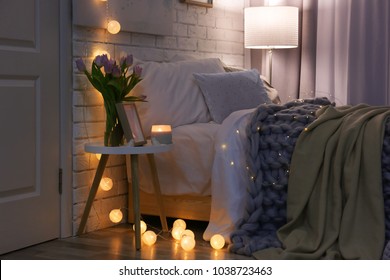 Cozy room interior with comfortable bed. Modern house design