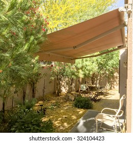 Cozy And Shady Automatic Retractable Awning For Extra Cooling, Arizona Backyard