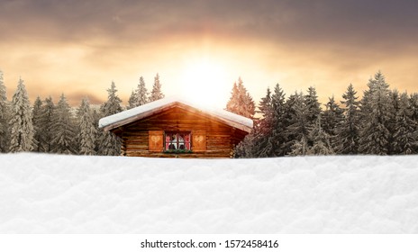 cozy snow covered ski hut in the woods - Powered by Shutterstock