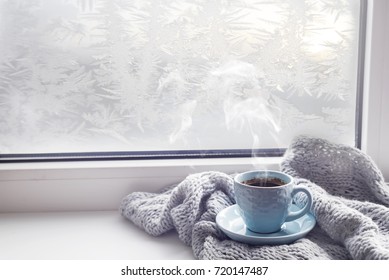 cozy soft gray blanket with a cup of coffee
