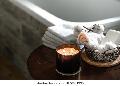 Cozy Spa Composition Of Aroma Of Candles And Bath Towels, Soap And Cotton Sprigs. Body Care And Hygiene Concept.