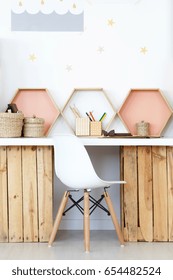 Cozy study space with wooden DIY desk and natural accessories