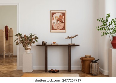 Cozy and stylish interior of living room with mock up poster frame, wooden console, flowers in vase, decorations and personal accessories. Modern home decor. Template.