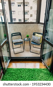 Cozy Terrace With Two Chairs And A Small Table