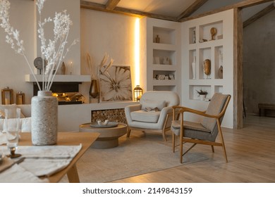 cozy warm home interior of a chic country house with an open plan, wood finishes, warm colors and a family hearth. view of the recreation area for family and guests - Shutterstock ID 2149843159