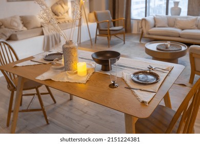 Cozy Warm Home Interior Of A Chic Country House With An Open Plan, Wood Finishes, Warm Colors And A Family Hearth. View Of The Dining Area, Table And Table Setting