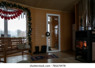 Cozy Winter Cottage Interior. Furnished Wooden Cottage Interior With Decoration