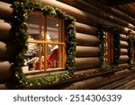 A cozy winter evening in Lapland, where snow-covered wooden houses are beautifully decorated with Christmas lights and festive decor. The icy, frosty landscape creates a holiday atmosphere