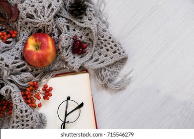 Cozy Winter Still Life: Cup Of Hot Coffee And Opened Book. Cup Of Tea With Open Book And Bunch Of Red Rowan On Wooden Background, Vintage Picture Style. Autumn, Fall Leaves, Flat Lay, Top View