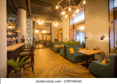 Cozy wooden interior in cafe, copy space. Comfortable modern dining place, contemporary design background - Powered by Shutterstock