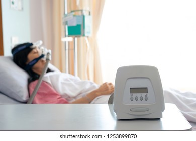 Cpap Machine Is Treating Senior Patient Woman Wearing Cpap Mask Sleeping Smoothly Without Snoring In Hospital Room.
Obstructive Sleep Apnea Therapy.