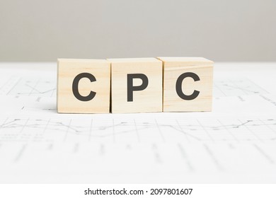 CPC wooden blocks word on grey background. CPC - short for Cost Per Click , information concepts.
