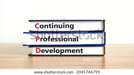 CPD, continuing professional development symbol. Books with words CPD, continuing professional development on beautiful white background. Business, CPD, continuing professional development concept.