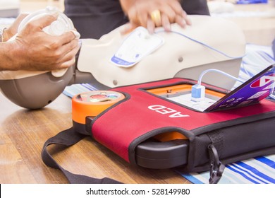 cpr with aed training  and blur background - Powered by Shutterstock