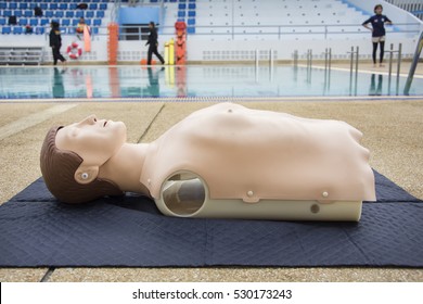 Cpr Dummy Training Nearside Swimming Pool Blur Background