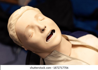 CPR First Aid Resuscitation Adult Man Life Size Training Dummy Model, Doll Face Closeup, Detail, Mannequin Mouth Wide Open, Medical Equipment. Paramedic Class Training Simple Props Abstract Concept