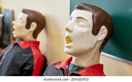 CPR First Aid Resuscitation Adult Man Life Size Training Dummy Model, Doll Face Closeup, Detail, Mannequin Mouth Wide Open, Medical Equipment. Paramedic Class Training Simple Props Abstract Concept