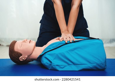 CPR Training ,Emergency and first aid class on cpr doll, Cardiopulmonary resuscitation, One part of the process resuscitation on unconscious person. - Powered by Shutterstock