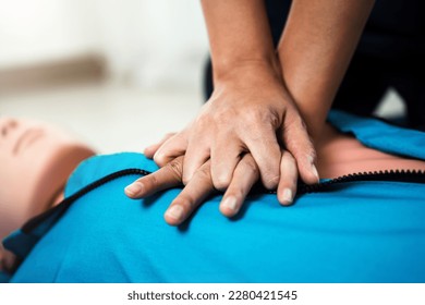 CPR Training ,Emergency and first aid class on cpr doll, Cardiopulmonary resuscitation, One part of the process resuscitation on unconscious person. - Powered by Shutterstock