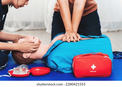 CPR Training ,Emergency and first aid class on cpr doll, Cardiopulmonary resuscitation, One part of the process resuscitation on unconscious person. - Shutterstock ID 2280421555