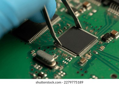 CPU chip on motherboard - with microcircuits and other computer parts