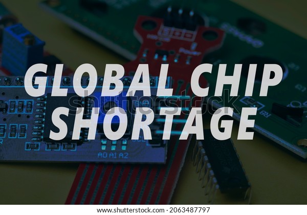CPU chip and\
semiconductors with car toy. Global car chip shortage. Micro-chip\
shortage creates dearth of new cars. Computer chip shortage stalls\
car industry production