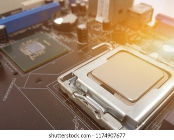 CPU placed on its socket on a black motherboard.