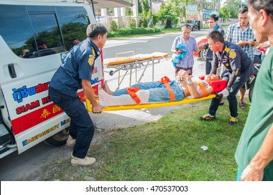 CR, THAILAND. August 18, 2016: Accident Car Crash With An Elderly Man Wounded And Received First Aid Correctly By The Rescue Team. 