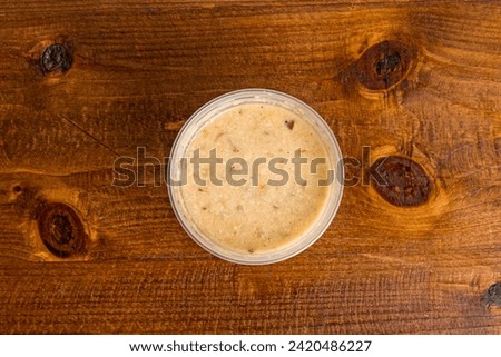 Crab bisque in a container
