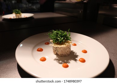 Crab Bound In A Lemon And Dill Mayonnaise Served With Parmesan Crisp And Red Pepper Coulis 