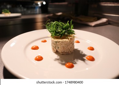 Crab Bound In A Lemon And Dill Mayonnaise Served With Parmesan Crisp And Red Pepper Coulis 