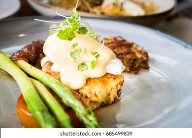 Crab Cake On Top With Egg Benedict.