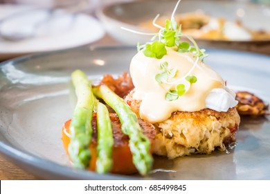 Crab Cake On Top With Egg Benedict.